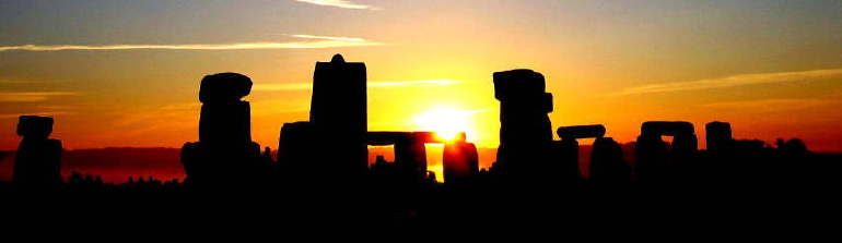 photo of sunrise over Stonehenge
